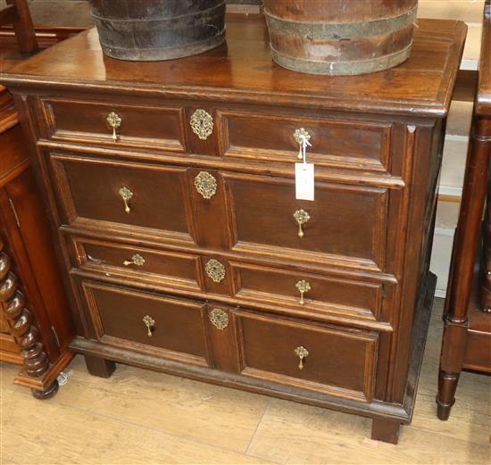 An 18th century geometric moulded oak chest W.92cm